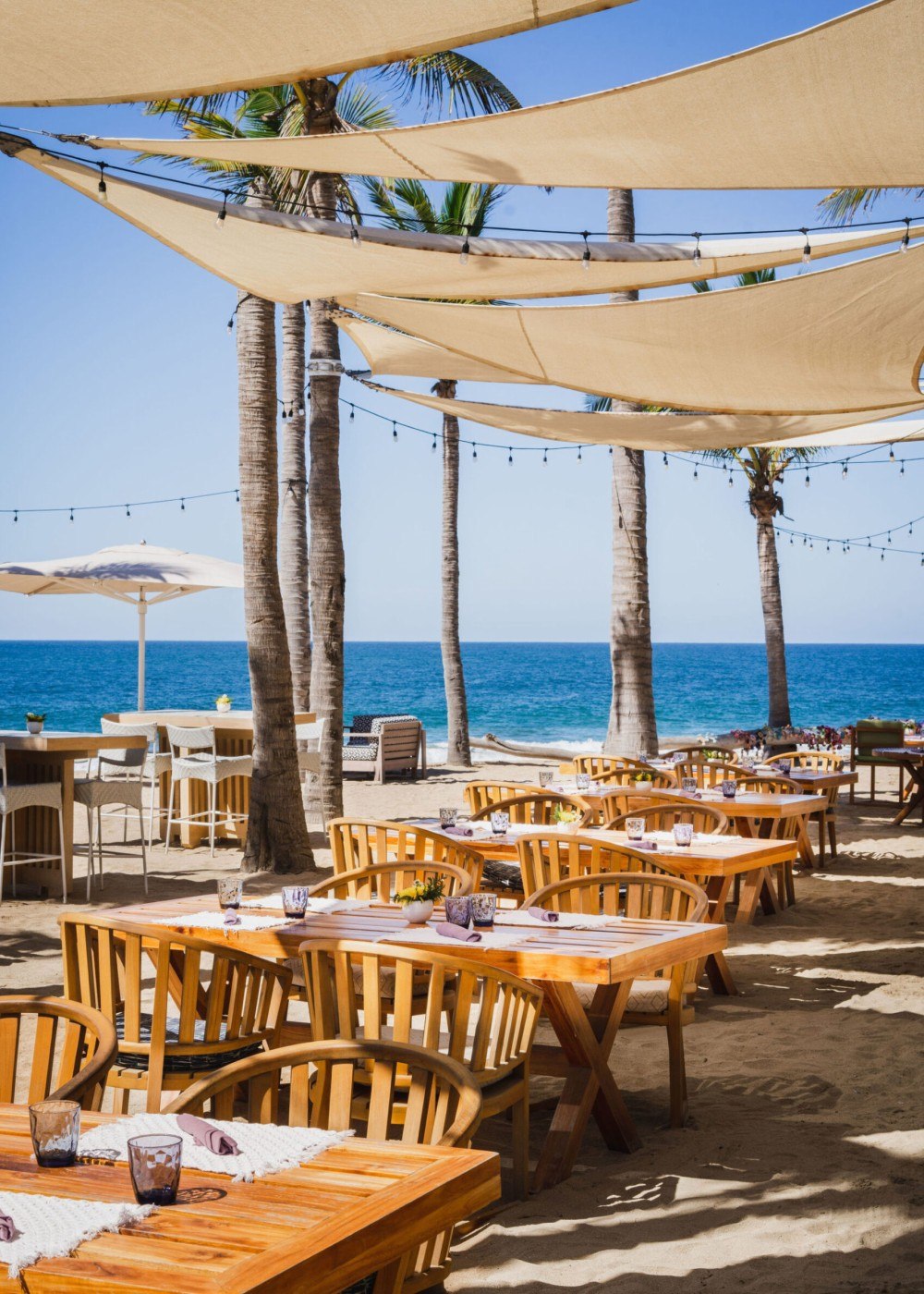 Picture of the dining tables on the beach